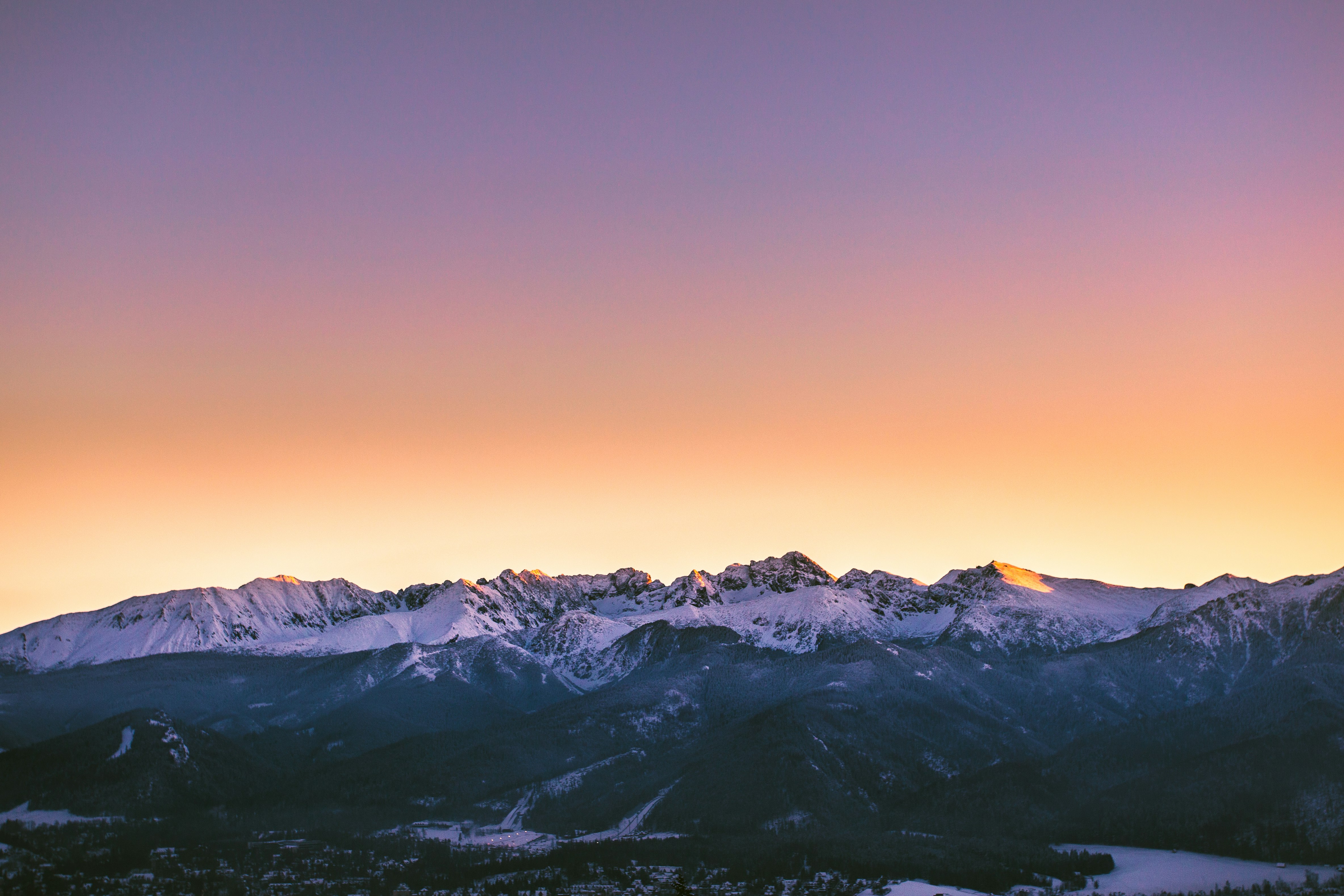 snow covered mountain during daytime